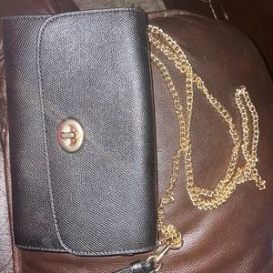 Coach clutch/crossbody with gold chain.